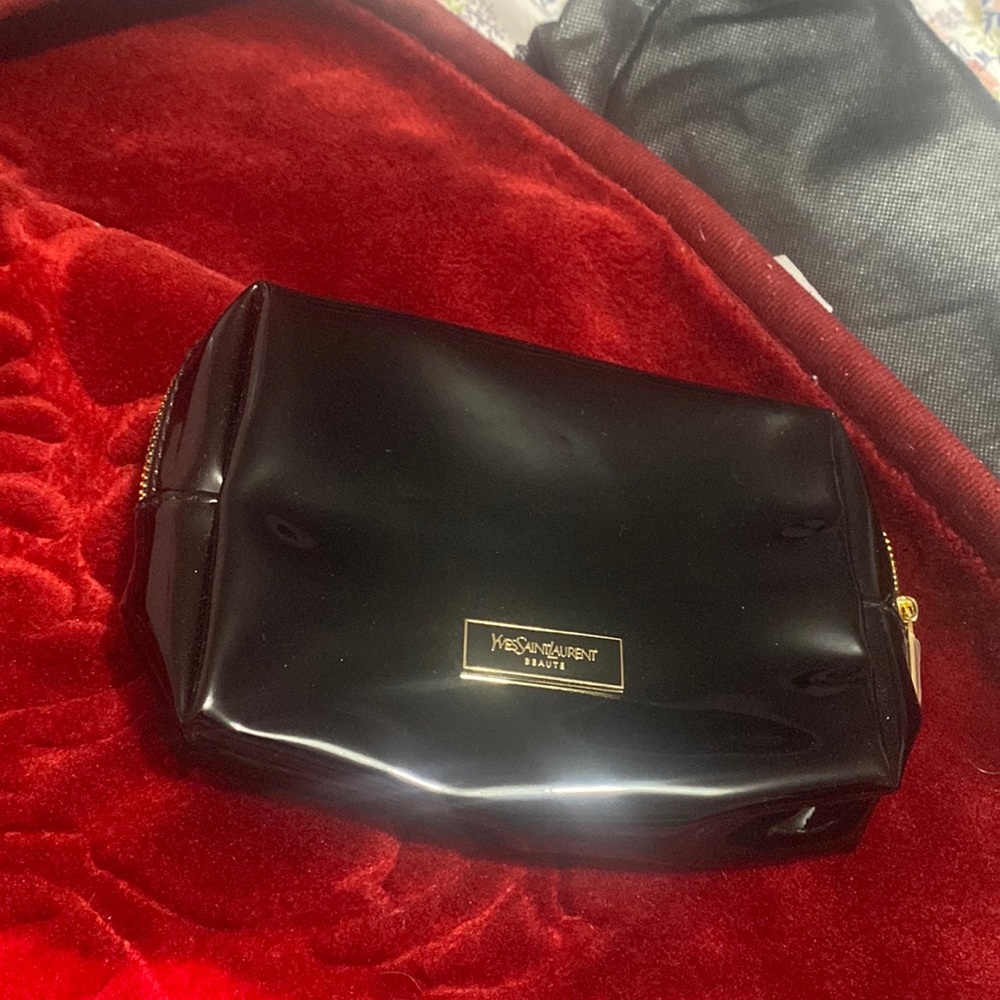 Ysl cosmetic bag comes with dust bag like new